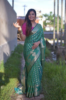 Load image into Gallery viewer, Mesmerizing Crystal Silk Banarasi Looked Saree